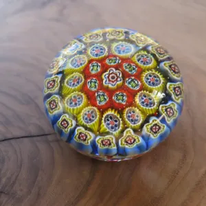 a thousand flowers glass paperweight