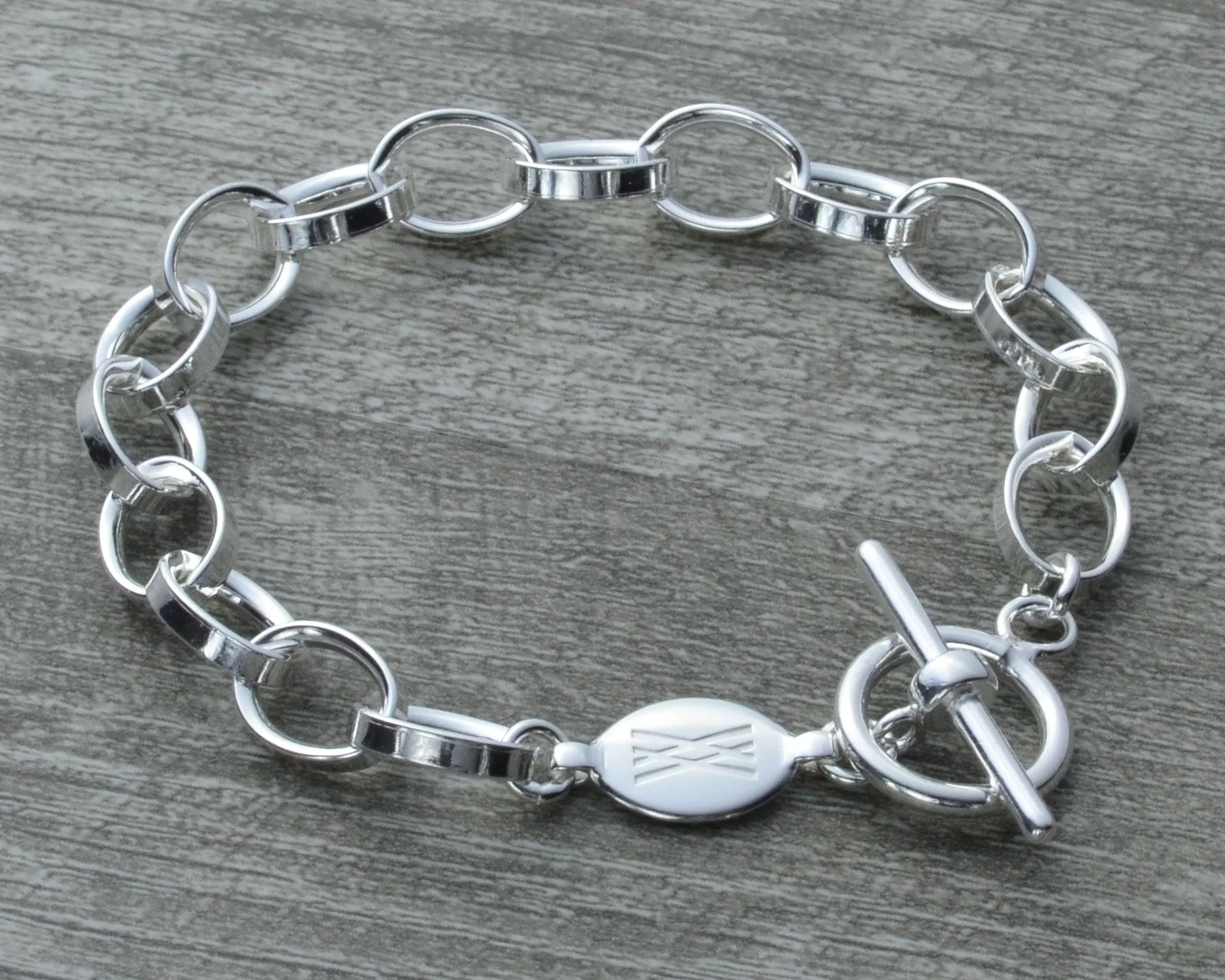 CLASSIC STERLING SILVER CHARM BRACELET - TOGGLE CLASP