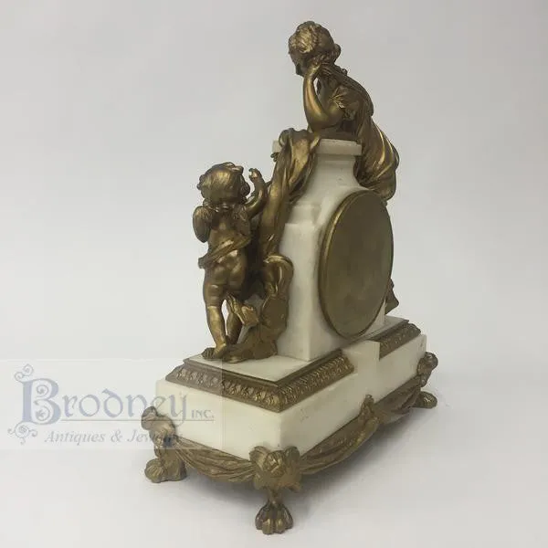 French Three Piece Bronze and Marble Clock Garniture
