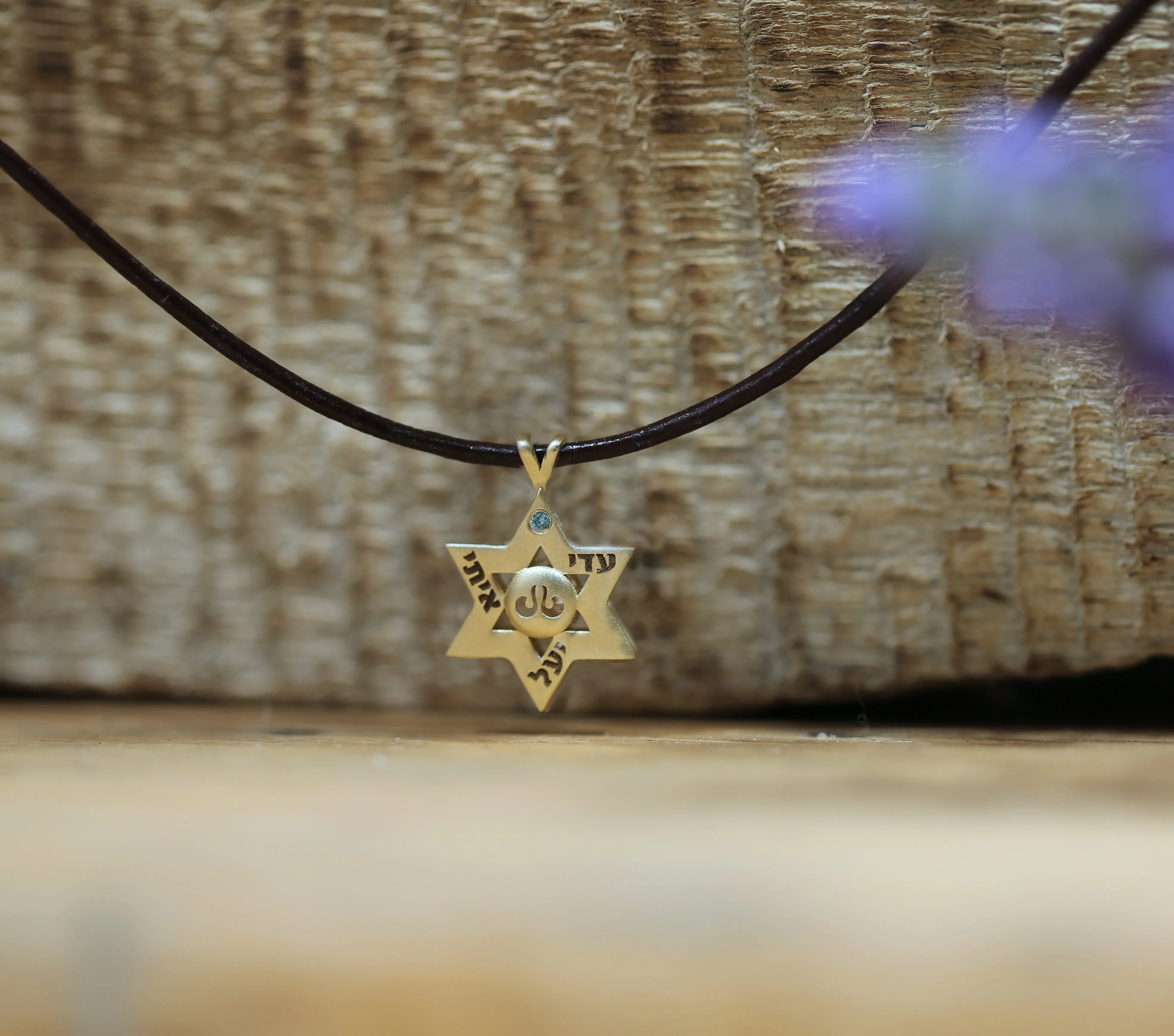 Star of David set with a Center lgd white Diamond