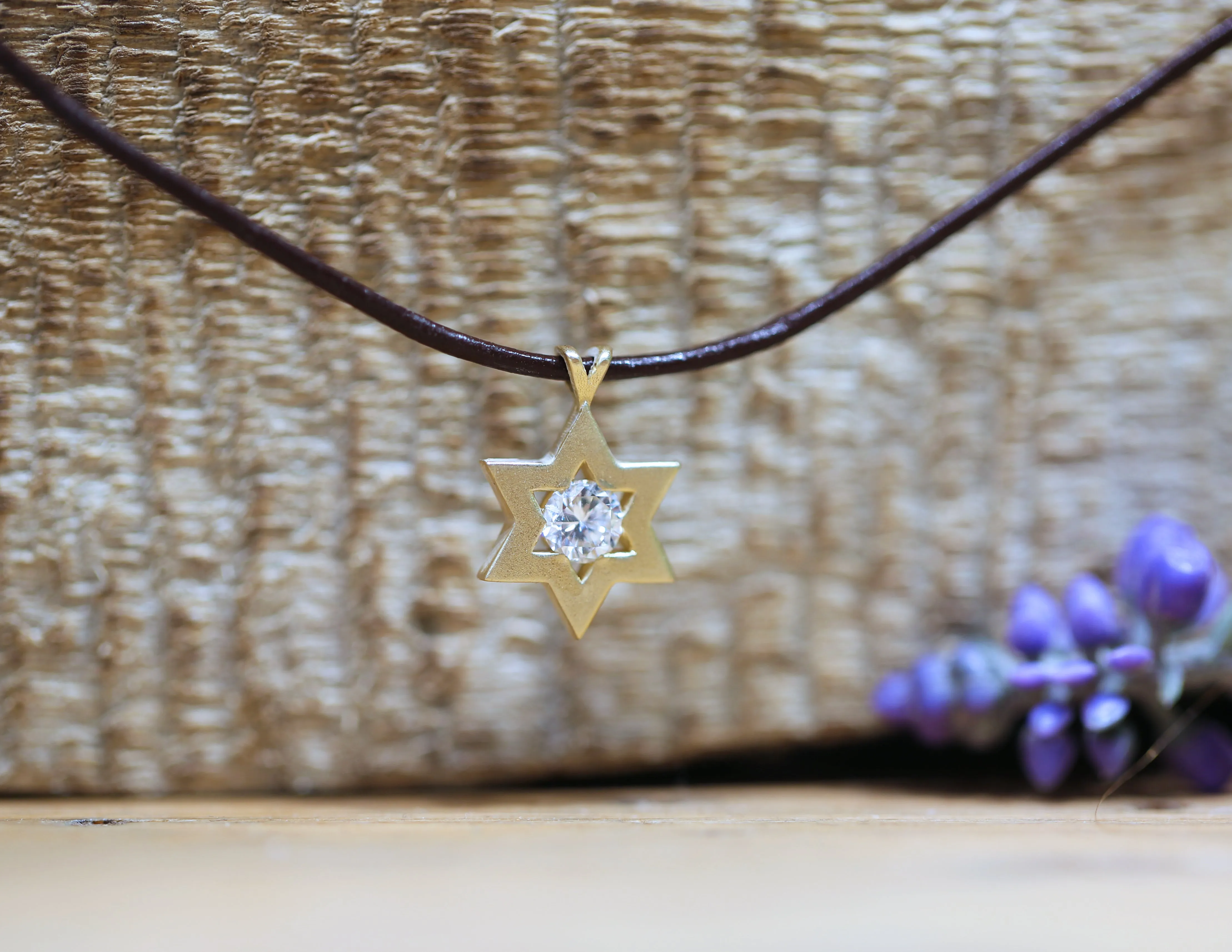 Star of David set with a Center lgd white Diamond